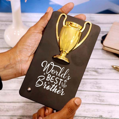 Crownlit World's Best Brother Metal Plaque with Golden Trophy, 16 x 9 cm, Black Decorative Stand, Gift for Raksha Bandhan